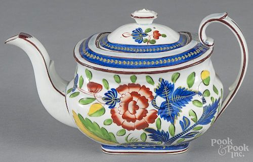 Gaudy Dutch porcelain carnation pattern teapot, 19th c., 6 3/4'' h.