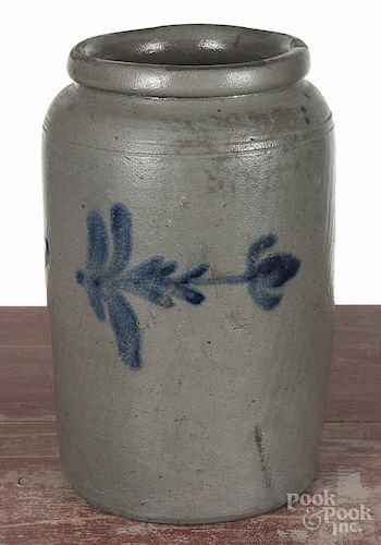 Pennsylvania stoneware jar, 19th c., with a cobalt floral band, 10 1/2'' h.