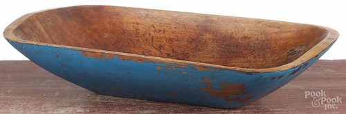 Painted wood trencher, 19th c., with a later blue surface, 18 1/4'' w.