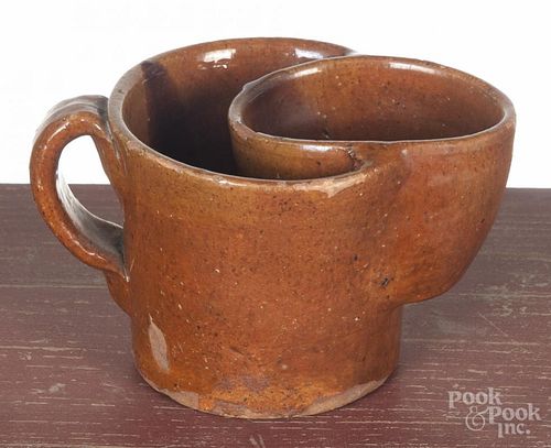 Pennsylvania redware shaving mug, 19th c., 4'' h.