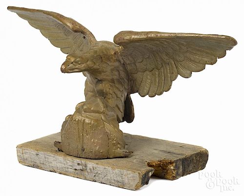 Cast iron pilot house eagle, 19th c., retaining an old gold painted surface, 30 1/4'' w.