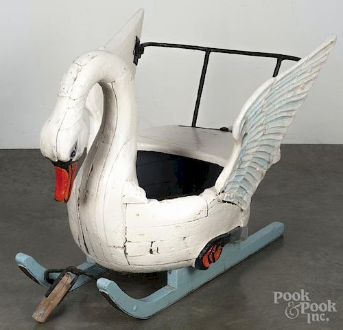 Carved and painted child's swan sled, ca. 1900, 28'' h., 37'' l.