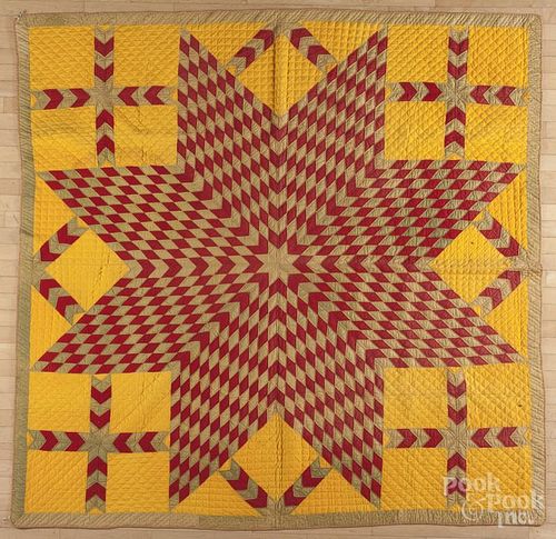 Pennsylvania lone star variant quilt, late 19th c., with a cheddar background, 82'' x 82''.