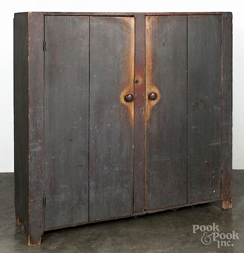 Pennsylvania painted pine pantry cupboard, 19th c., retaining an old gray over red surface, 54'' h.