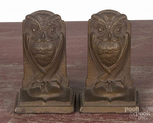 Pair of arts and crafts bronze owl bookends, early 20th c., 5 1/2'' h.