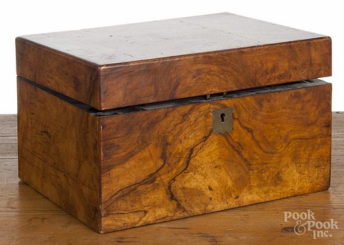 Regency burled walnut sewing box, late 19th c., with a fitted interior, 6 1/2'' h., 11'' w.