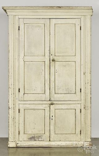 Large Pennsylvania painted pine wall cupboard, 19th c., with blind doors