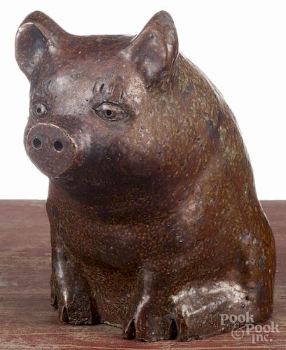 Large sewer tile seated pig, ca. 1900, initialed EJE, 9 1/2'' h.