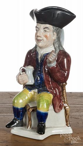 Staffordshire figural Toby jug, 20th c., 11 3/4'' h.