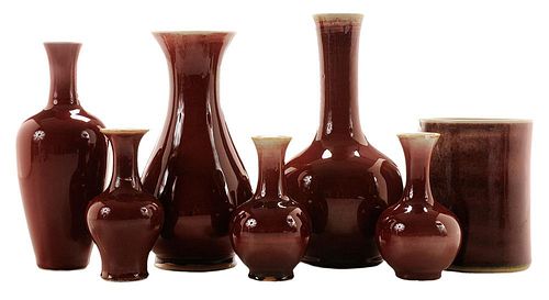 Six Copper-Red Porcelain Vases and a