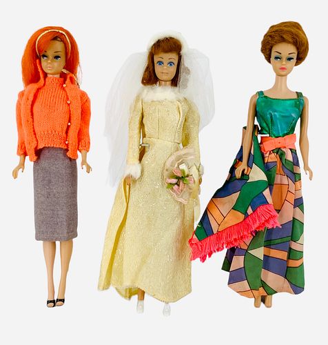 (3) Barbies. Midge in wedding dress & (2) Fashion Queen Barbies w/ wigs on & may/may not have minor damage under the wigs. Midge looks fine.