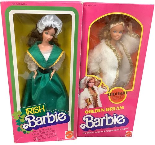 (2) 1980's Pink boxed Barbies including (1) Irish Barbie & (1) Golden Dream Barbie. Golden Dreams Barbie is MIB. Irish Barbie's box has crimping & wea