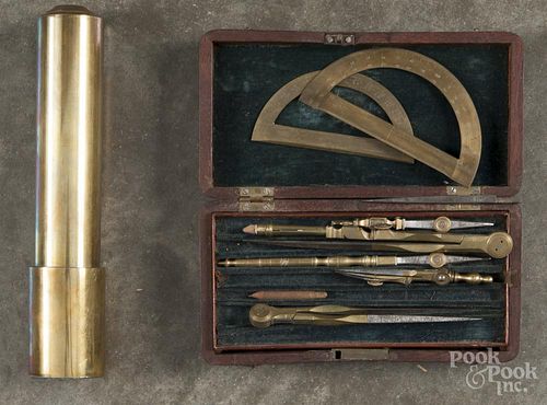 Brass kaleidoscope, 20th c., 8 1/2'' l., together with a cased brass draftsman set.