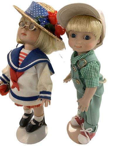 Lot of 2 hard plastic Mary Engelbreit dolls w/inset eyes @ approx 10" tall. Both boy and girl dolls, the girlÃ­s outfit is dusty & needs cleaned. Circ