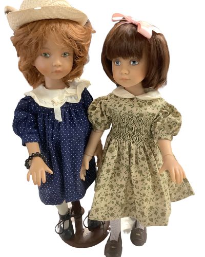 Lot of 2 Dianna Effner hard vinyl dolls @ approx 12" tall with painted faces, blue eyes. DollÃ­s outfits are in cotton and they are ball jointed.