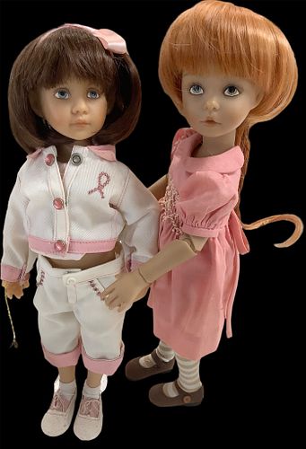 Lot of 2 pretty in pink Dianna Effner dolls in hard vinyl and painted faces @ approx 12" & 13" respectively. Doll in short pants retains manufacturerÃ