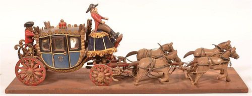 Carved and Painted Wood Folk Art Coach.