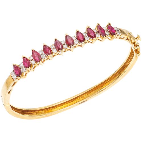BRACELET WITH RUBIES AND DIAMONDS IN 18K YELLOW GOLD Marquise cut rubies ~2.30 ct, Brilliant cut diamonds ~0.66 ct | PULSERA CON RUBÍES Y DIAMANTES EN