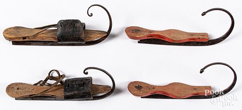 Two pairs of early ice skates