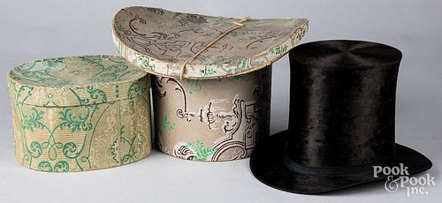 Two wallpaper hat boxes