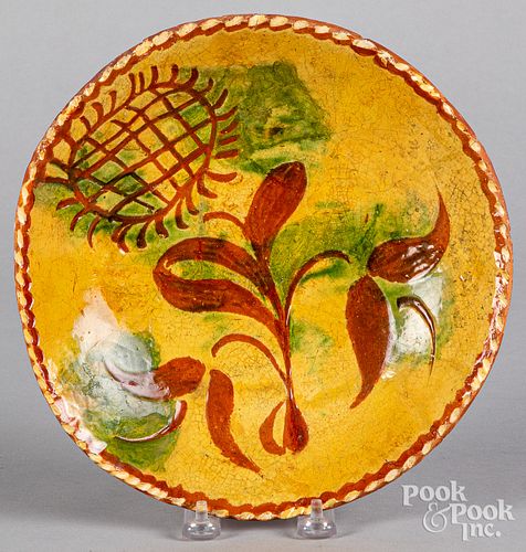 Pennsylvania sgraffito redware plate, ca. 1800