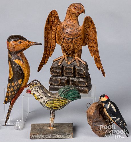 Four carved and painted birds, 20th c.