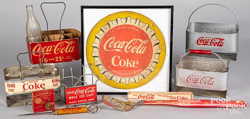 Group of Coca-Cola advertising items
