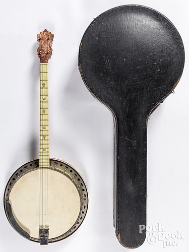 Florence four string banjo, with fifteen frets