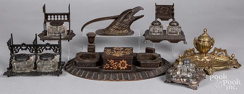 Collection of inkwells and pen rests