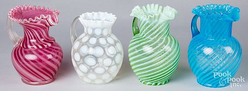 Four Victorian opalescent pitchers, late 19th c.