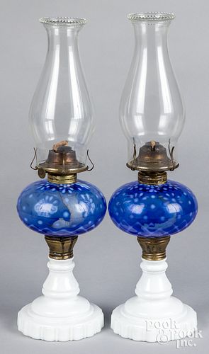 Pair of blue opalescent oil lamps, 19th c.