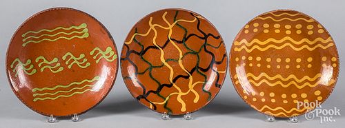 Three Greg Shooner redware plates
