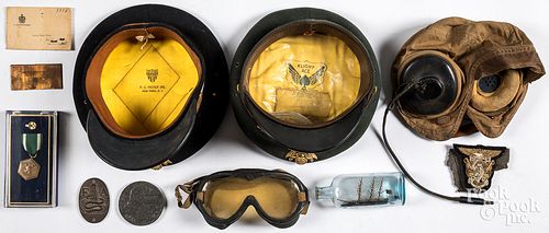 Group of military items, to include two visor caps