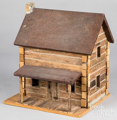 Contemporary wood, stone, and tin log cabin model