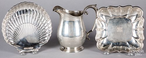 Two sterling silver serving dishes and a pitcher