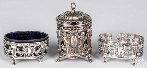 Three Continental silver condiment holders, 19th c