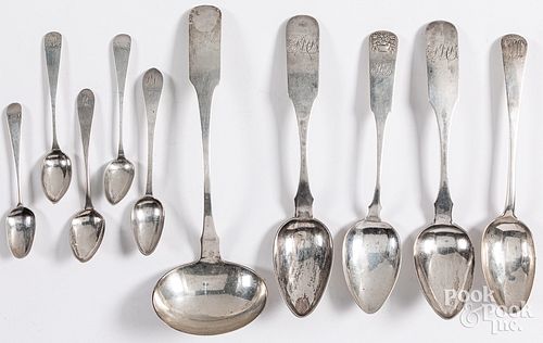 Coin silver ladle, together with a group of spoons