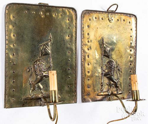 Pair of brass rampant lion wall sconces