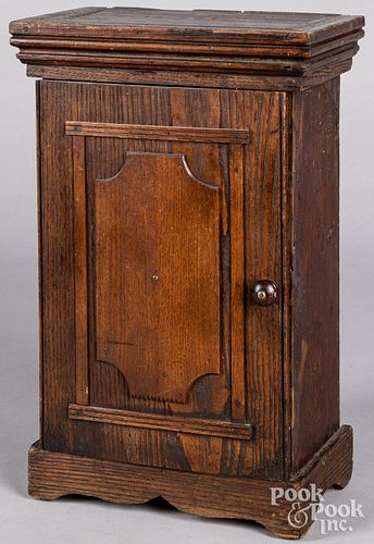 Small oak table top cabinet, late 19th c.