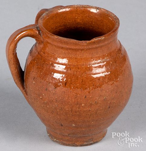 Redware double handled cup, 19th c.