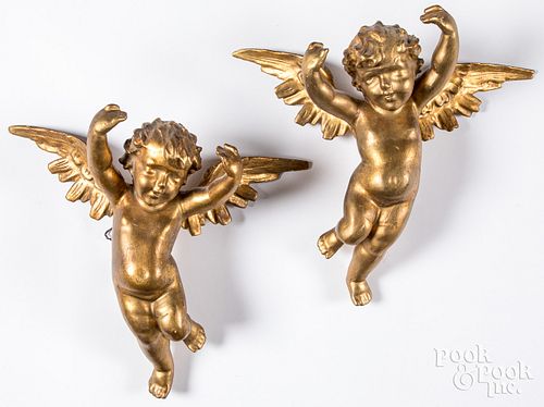 Pair of carved giltwood putti