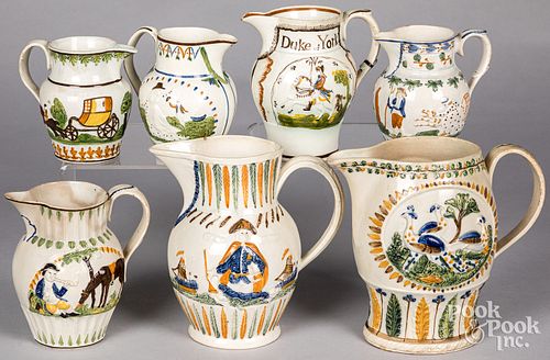 Seven Pratt type pearlware pitchers, 19th c.