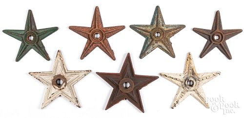 Seven painted cast iron architectural stars