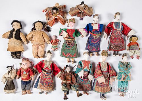 Collection of Asian dolls.