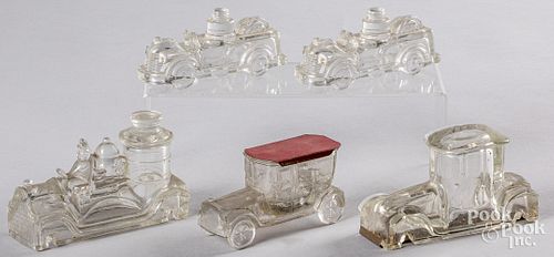 Five glass candy containers
