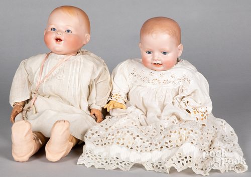 Two bisque head baby dolls