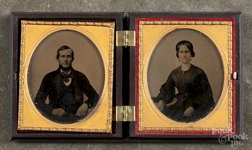 Ambrotype double-family portrait in a gutta percha case, 3 1/4'' h.