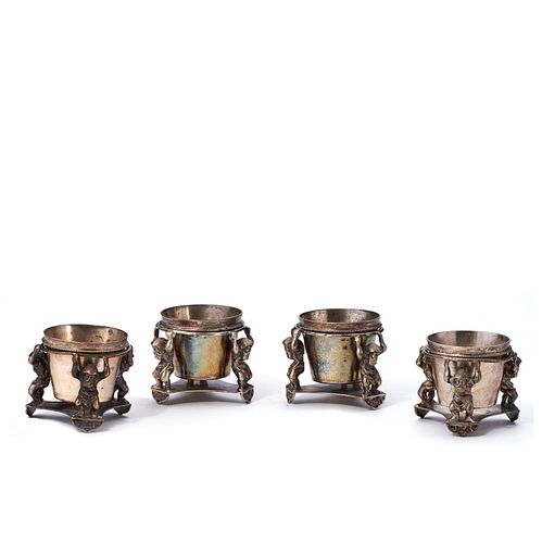 Set of four English silver plated master salt cups