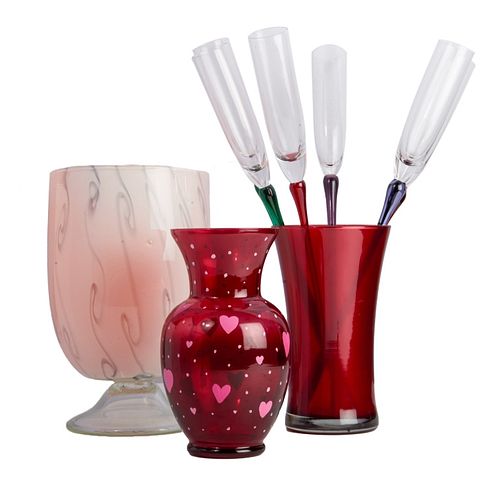 group of glass objects (champagne flutes in vase)
