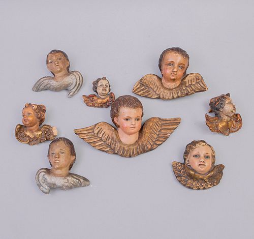 Lote de ángeles. México, SXIX-XX. Tallas en madera policromada y dorada. Piezas: 8